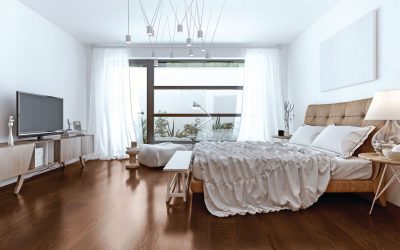 Light wooden flooring in a modern living room interior by Greenlam Industries